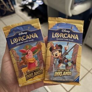Disney Lorcana Into the Inklands Pack with Piglet - Gold and Blue
